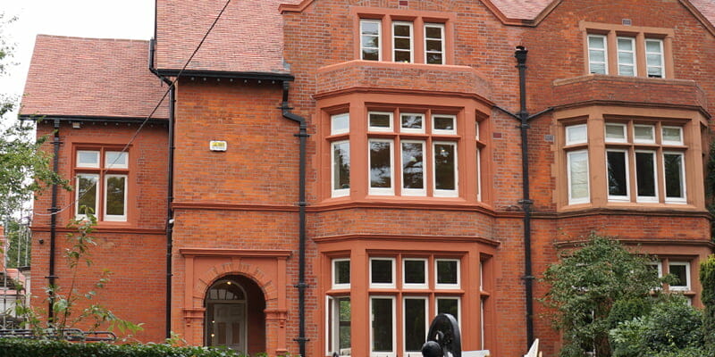 P Mac restoring red brick facade Dublin