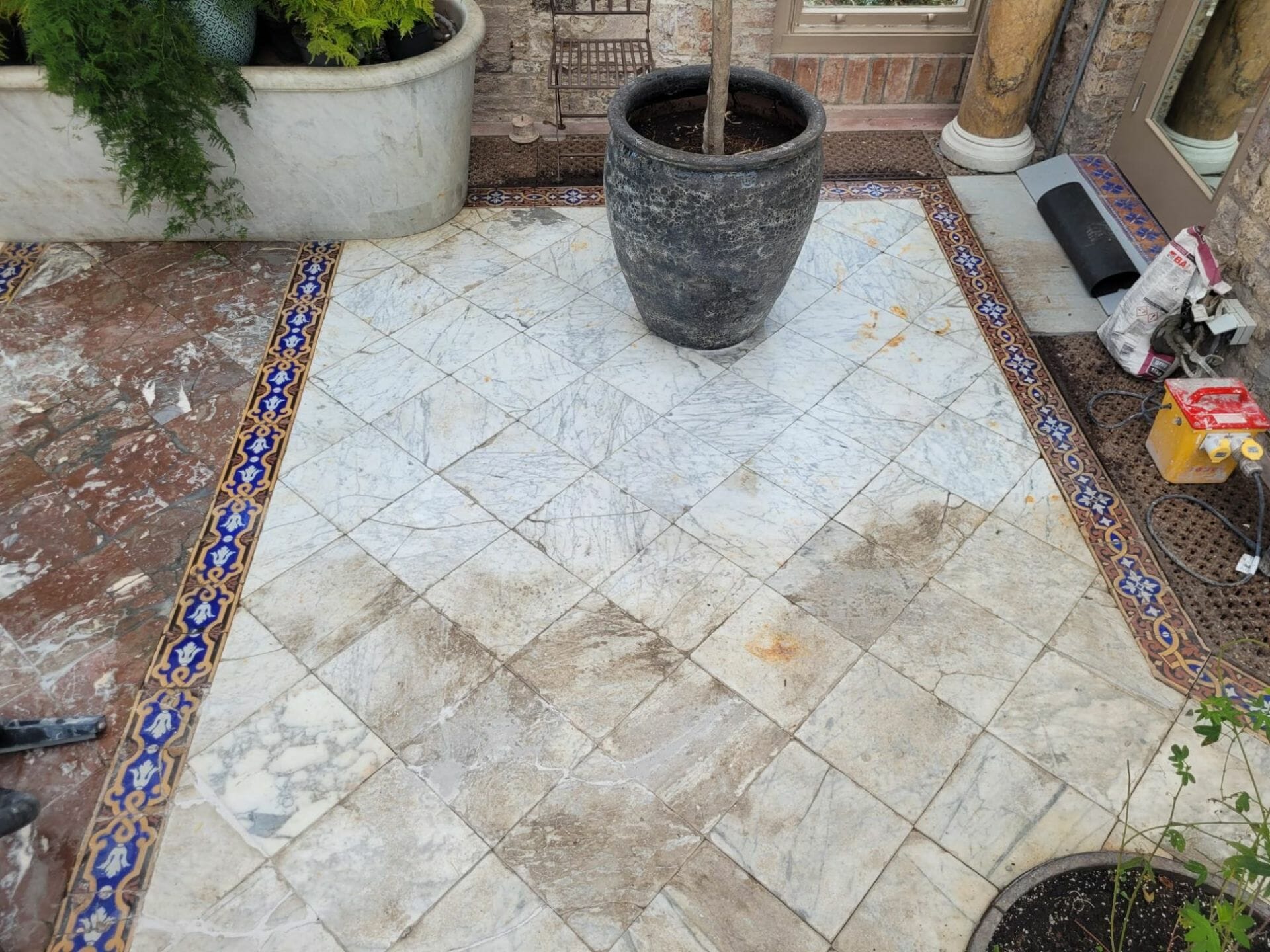 Heavily stained marble stone tiles