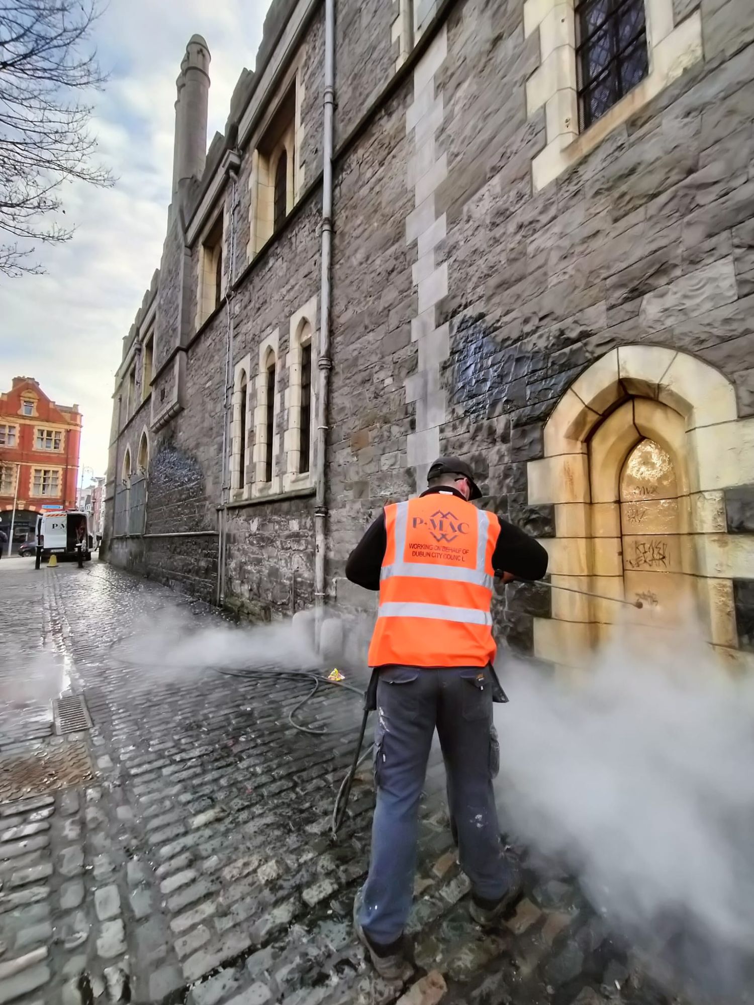 PMAC graffiti team removing graffiti from St Patricks Cathedral in Dublin