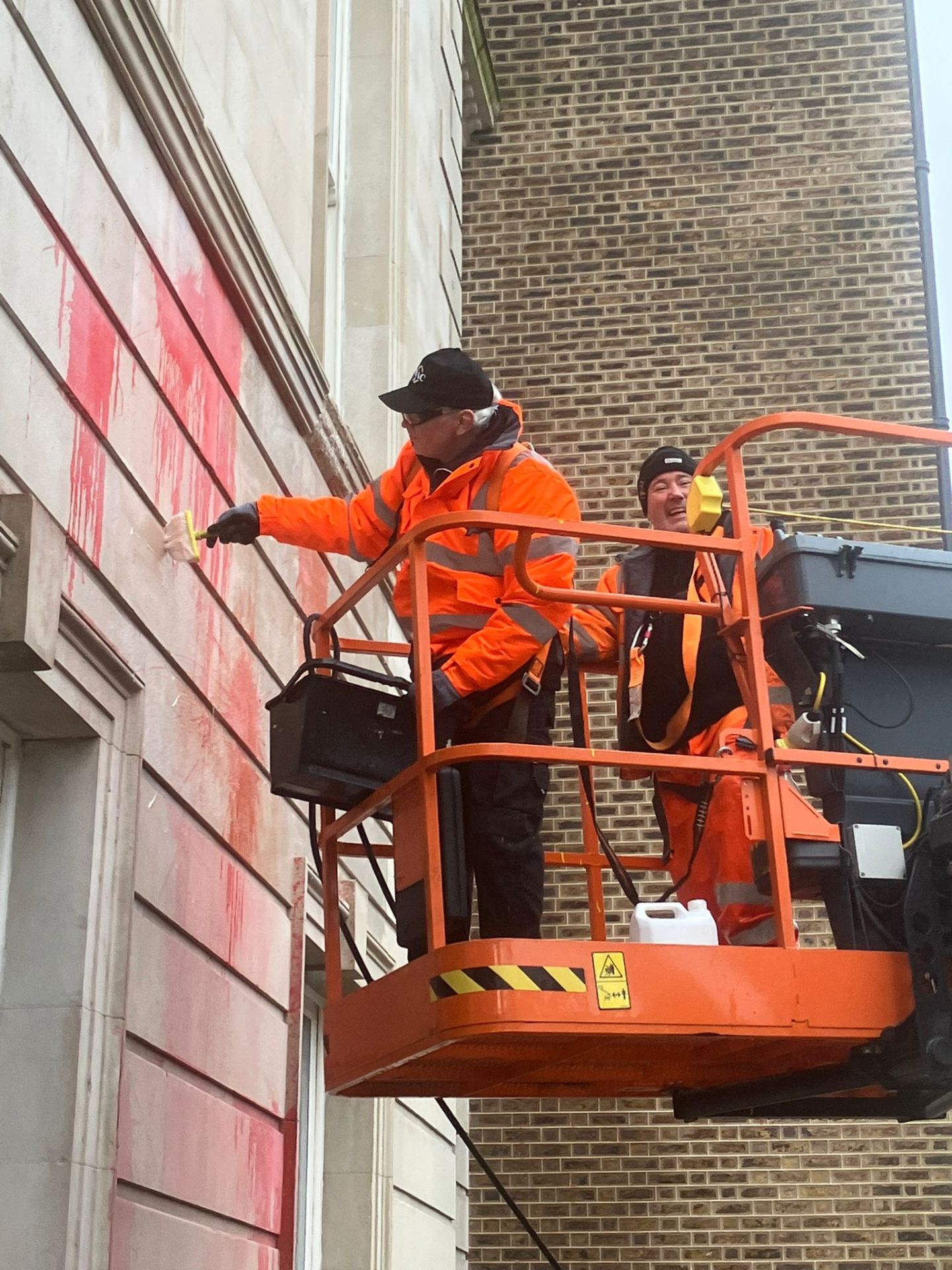 PMAC operator removing graffiti