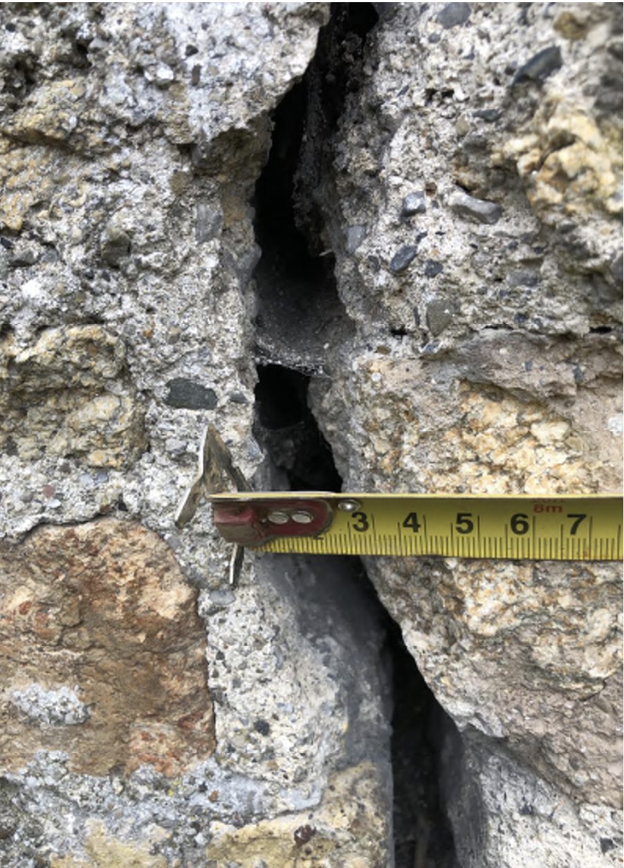 Restoration of Parochial Garden Wall showing large cracks