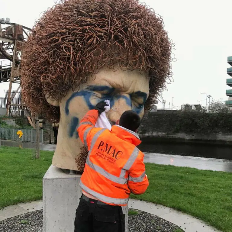 Graffiti removal at Luke Kelly statue by PMAC