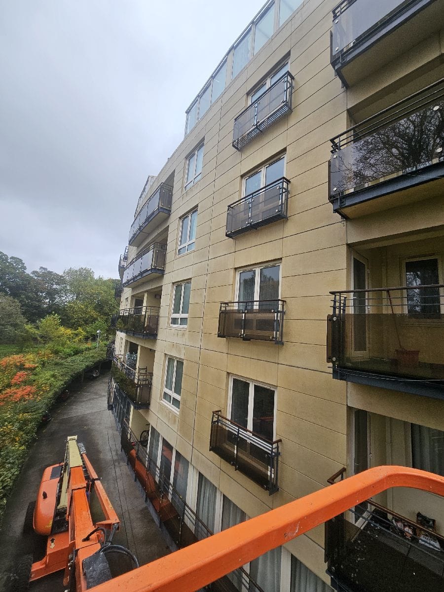 PMAC using MEWP to clean facade at the Pines in Ballsbridge